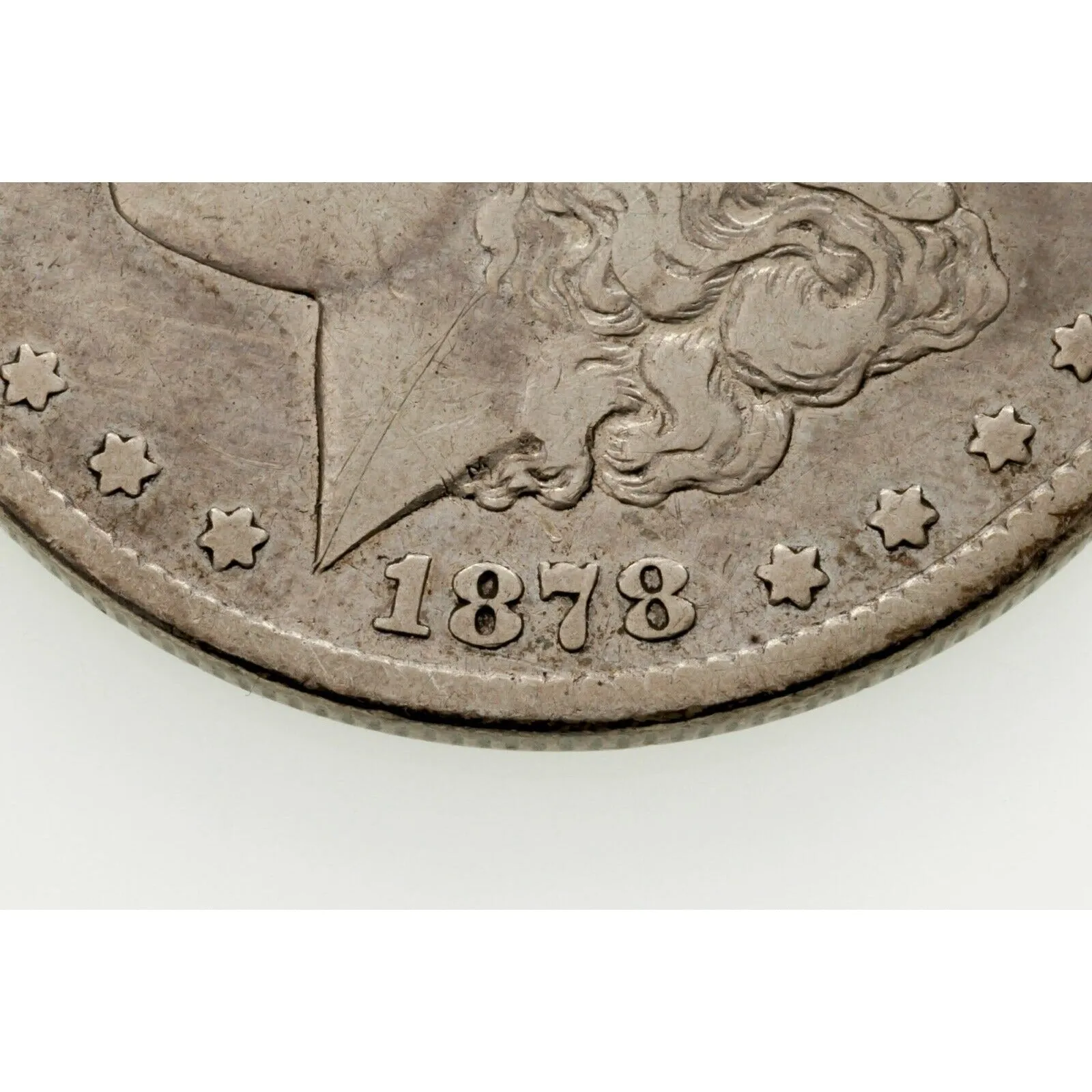 1878-CC $1 Silver Morgan Dollar in Very Good Condition, Light Gray Color