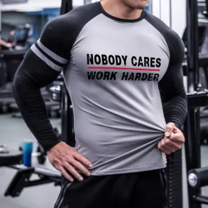 NOBODY CARES WORK HARDER LINE RAGLAN GRAPHIC LONG SLEEVE T-SHIRT